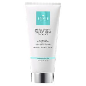 Envie Skin and Body Enviеd Smooth AHA/BHA Scrub Cleanser tube with exfoliating properties, featured in skincare product listing.