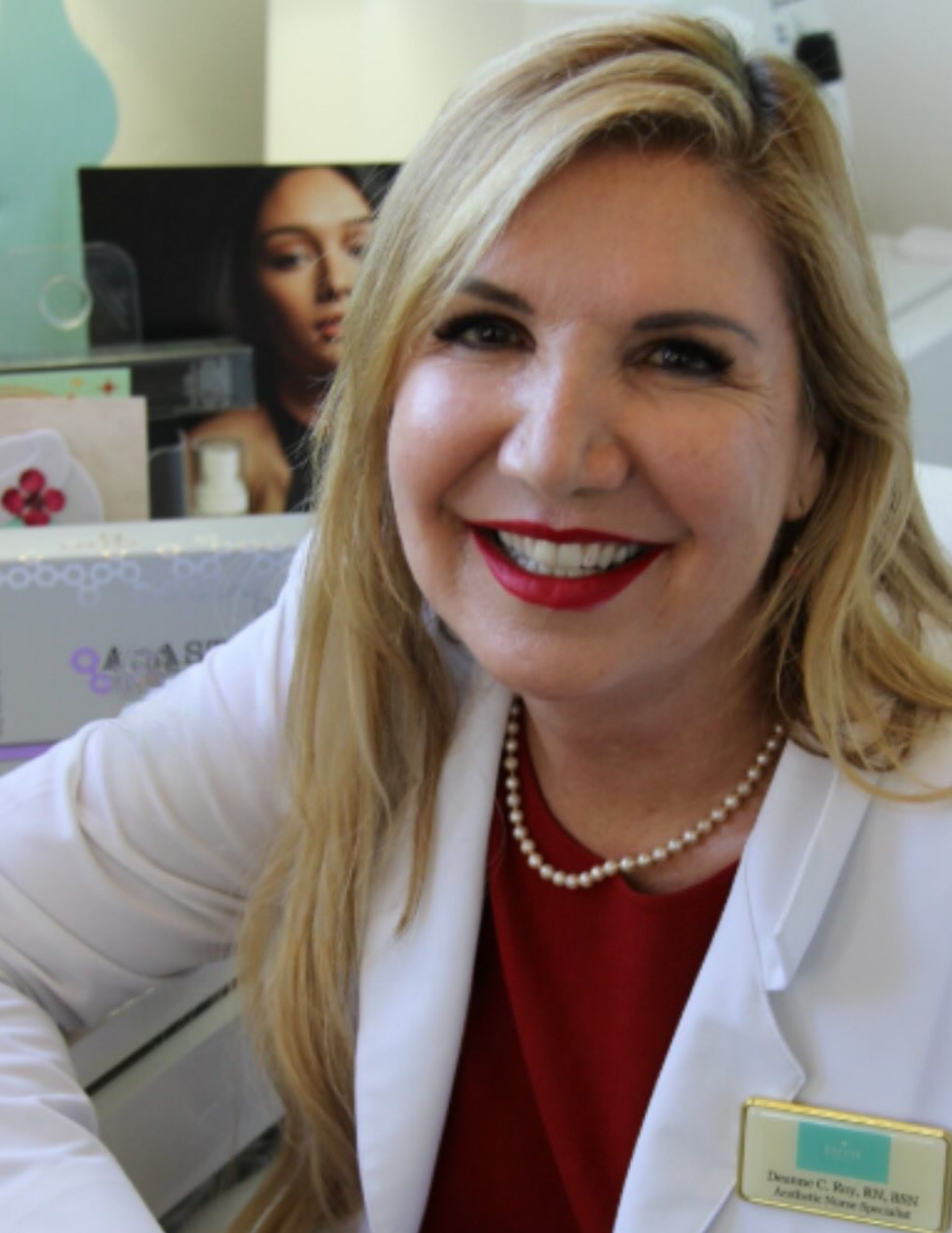 Deanne Aesthetic Nurse Specialist Deanne C. Roy, Aesthetic Nurse Specialist at Envie Skin and Body, smiling in a white lab coat, showcasing expertise in Botox treatments with a focus on patient safety and natural results.